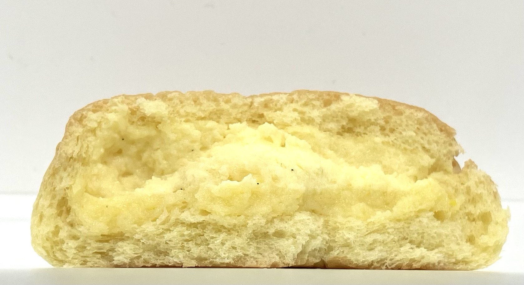 seveneleven-brioche-custard-cream-bun-eating 