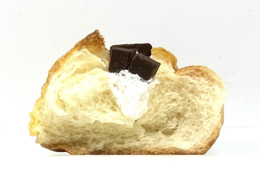 lawson-sweets-cream-puff-roll-chocolate-whipped-eating
