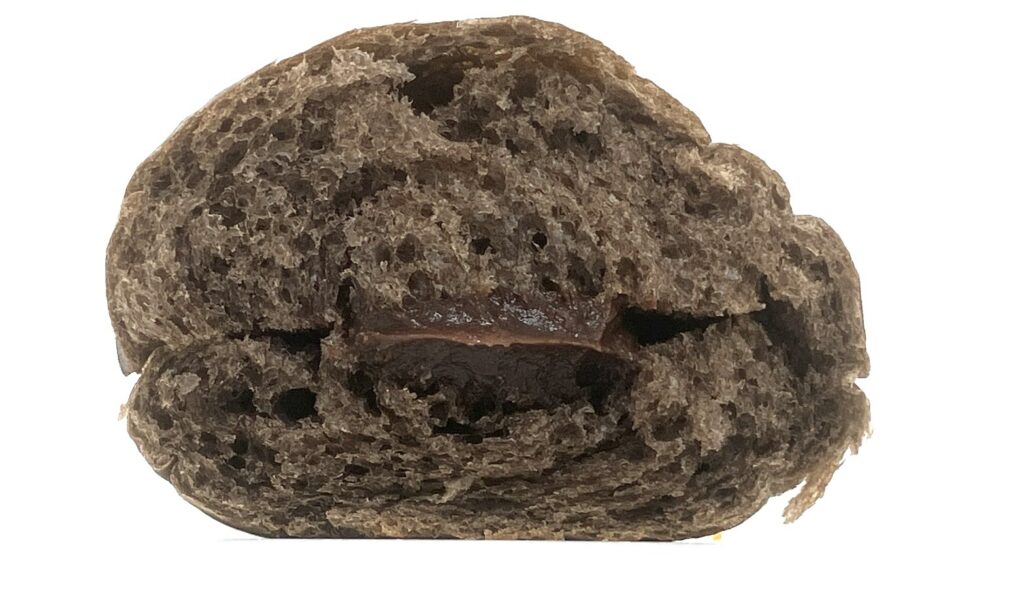 lawson-sweets-salted-chocolate-cream-roll-eating
